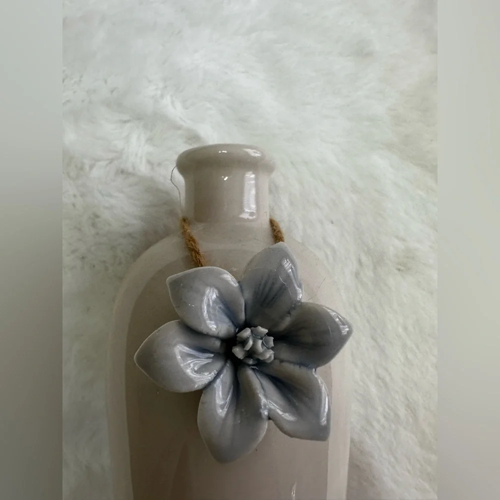 Elegant Cream Vase with light blue Floral Accent